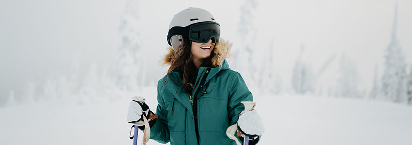 Girl skiing wearing Retrospec Zephyr Snow Helmet