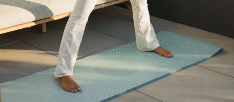 Stretching on comfortable yoga mat