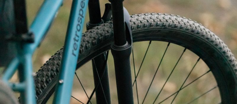 A close, detailed view of a mountain bike tire and its tread