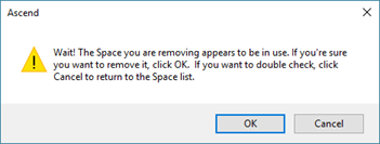 Screenshot of a pop up that says, "Wait! The Space you are removing appears to be in use. If you're sure you want to remove it, click OK. If you want to double check, click Cancel to return to the Space list." There are OK and Cancel buttons