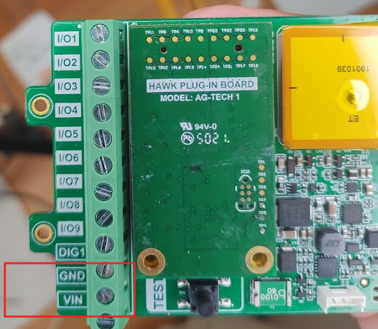 A green circuit board with white text

Description automatically generated