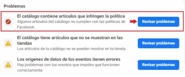 Acessar o relatório de erros do catálogo, com uma seta indicando para clicar no botão "Revisar problemas". Em espanhol