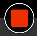 Stop button, Panopto Express recorder. It is a red square inside of a circle, located in the bottom-middle of the Panopto Express recorder. It only appears when a recording is in progress.